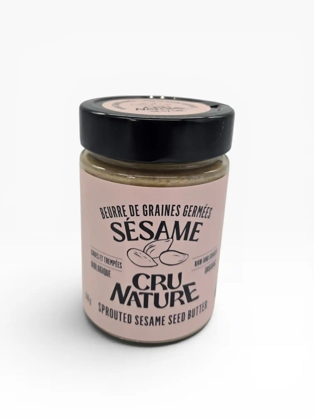 Vue rapprochée du pot de beurre de graines de sésame germées, crues et biologiques Cru Nature